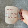 Pink mug with saying in Lithuanian