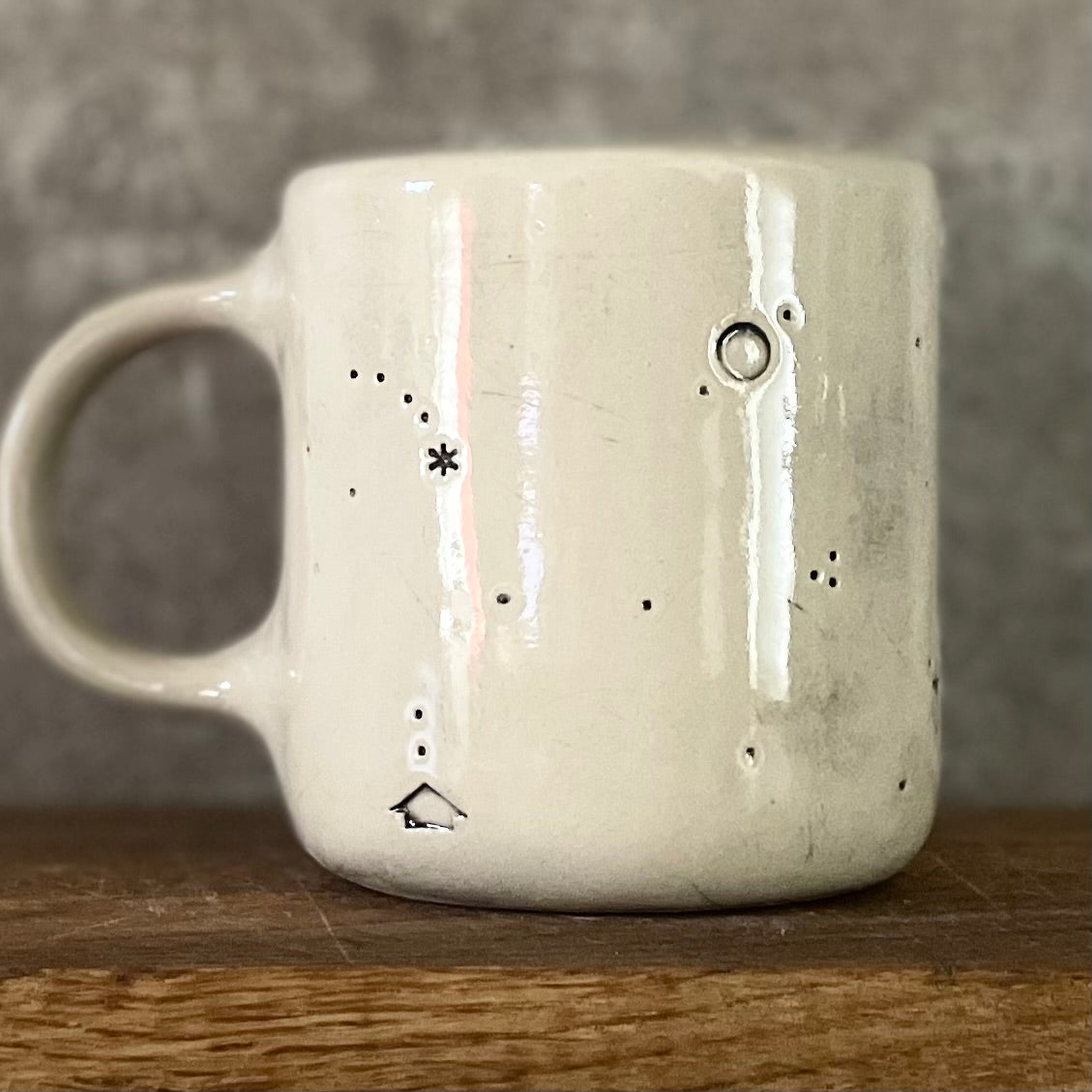 Ceramic mug with saying about magic