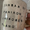 Speckled mug with words about work - another
