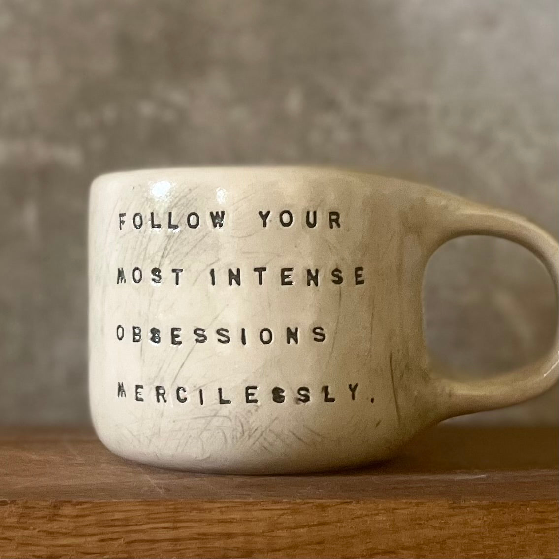 Ceramic coffee mug with quote by Kafka