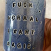 Deep blue mug with magic saying