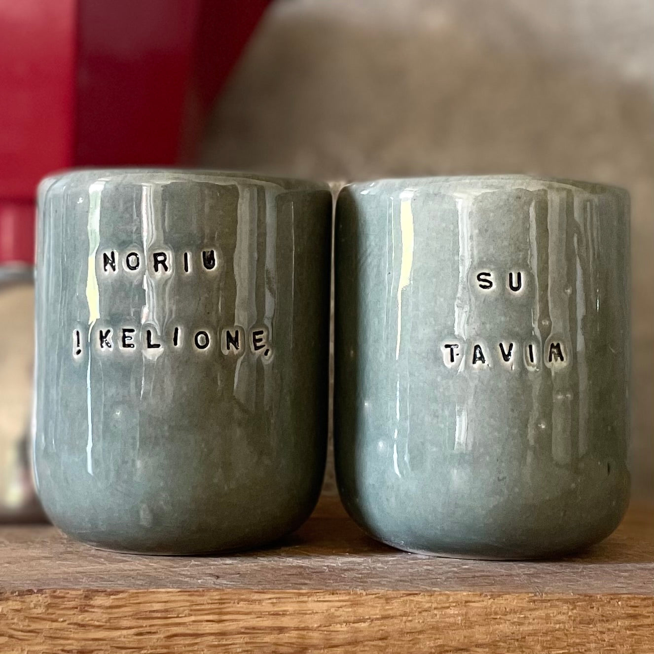 Set of small grayish mugs