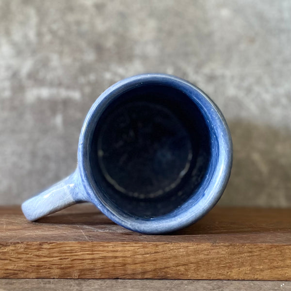 Blue mug with funny phrase in Lithuanian
