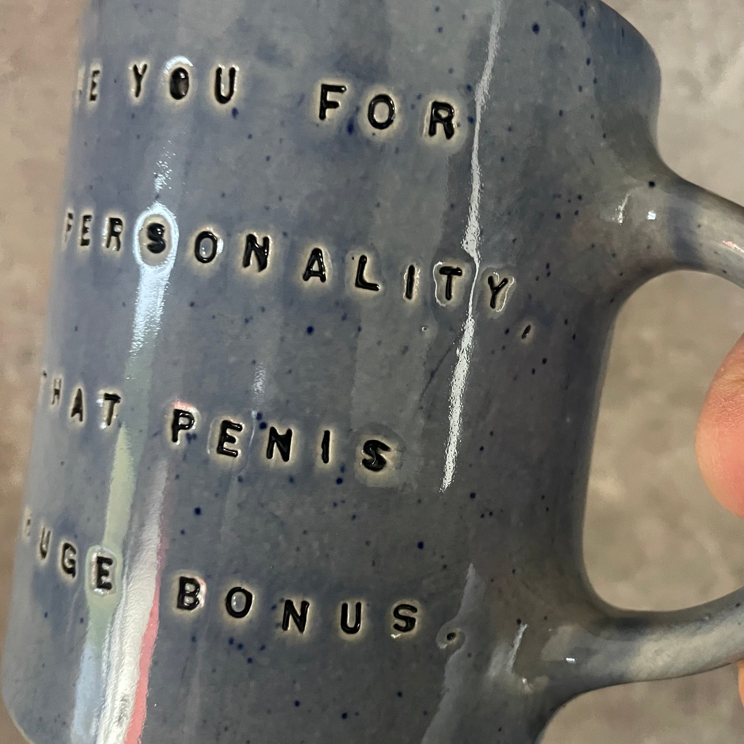 Handmade blue ceramic mug with funny text