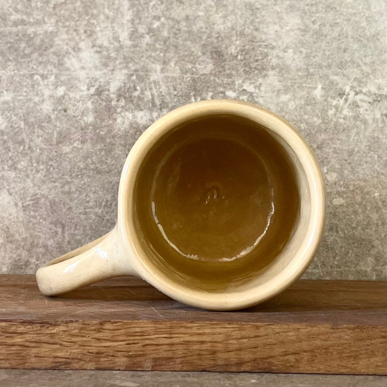 Yellow mug with words about work