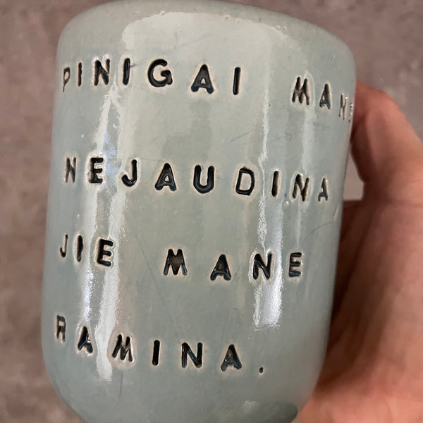 Ceramic mug about money