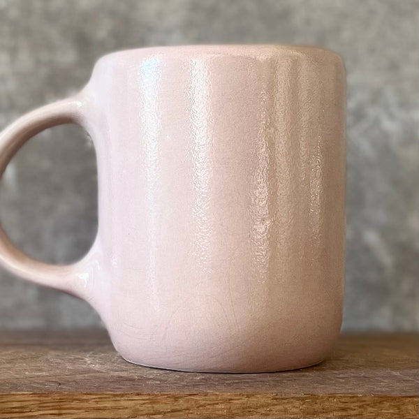 Pink big mug with saying in Lithuanian