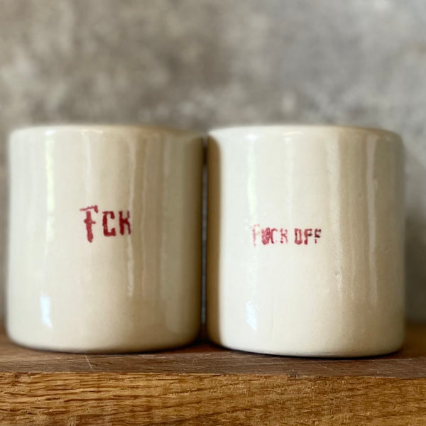 Two small bad mood mugs