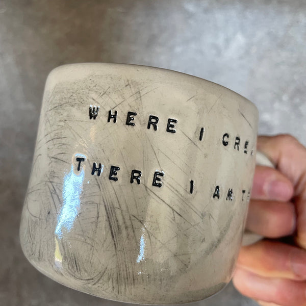 Ceramic mug with artist quote