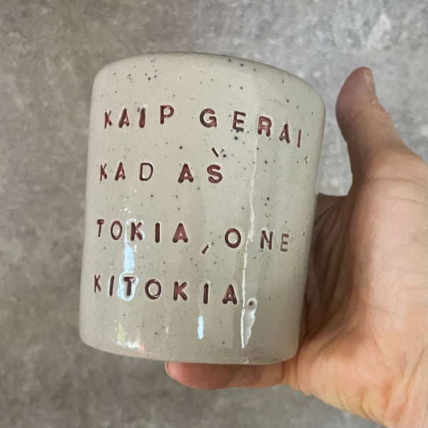 Pink mug with words of self acceptance