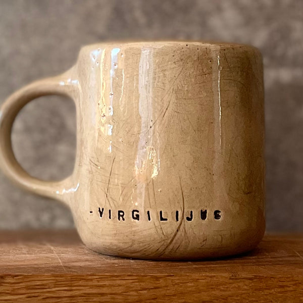 Beige ceramic mug with quote by Vergil
