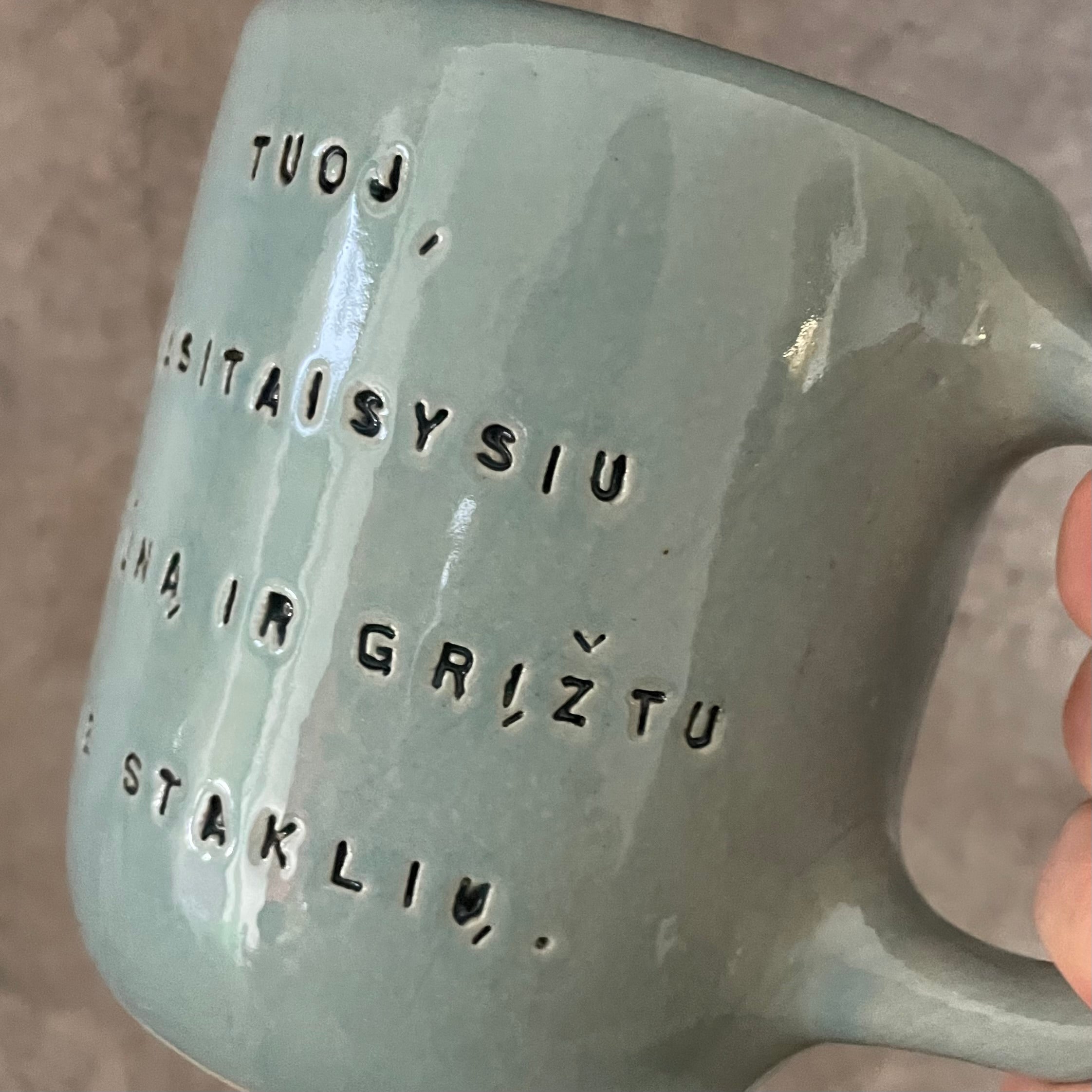 Blue mug with funny phrase in Lithuanian