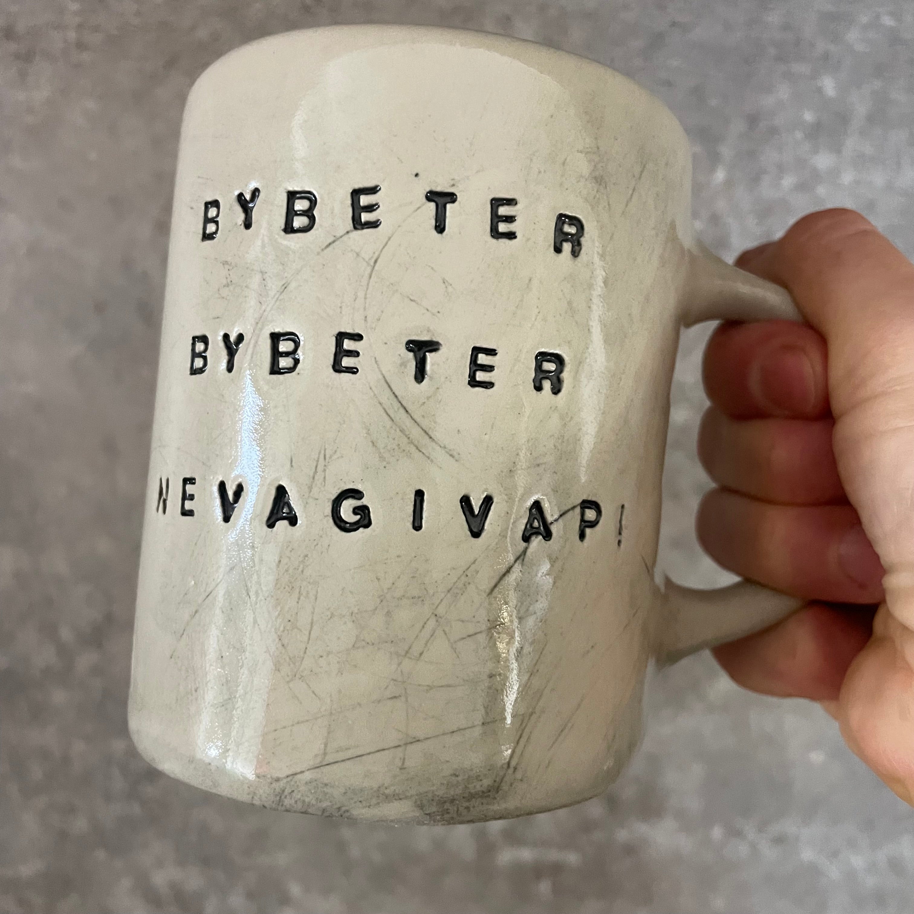 White mug with motivational saying