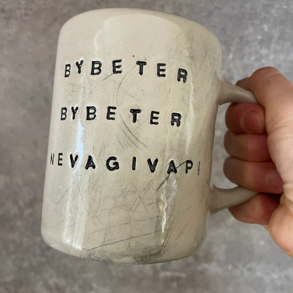 White mug with motivational saying