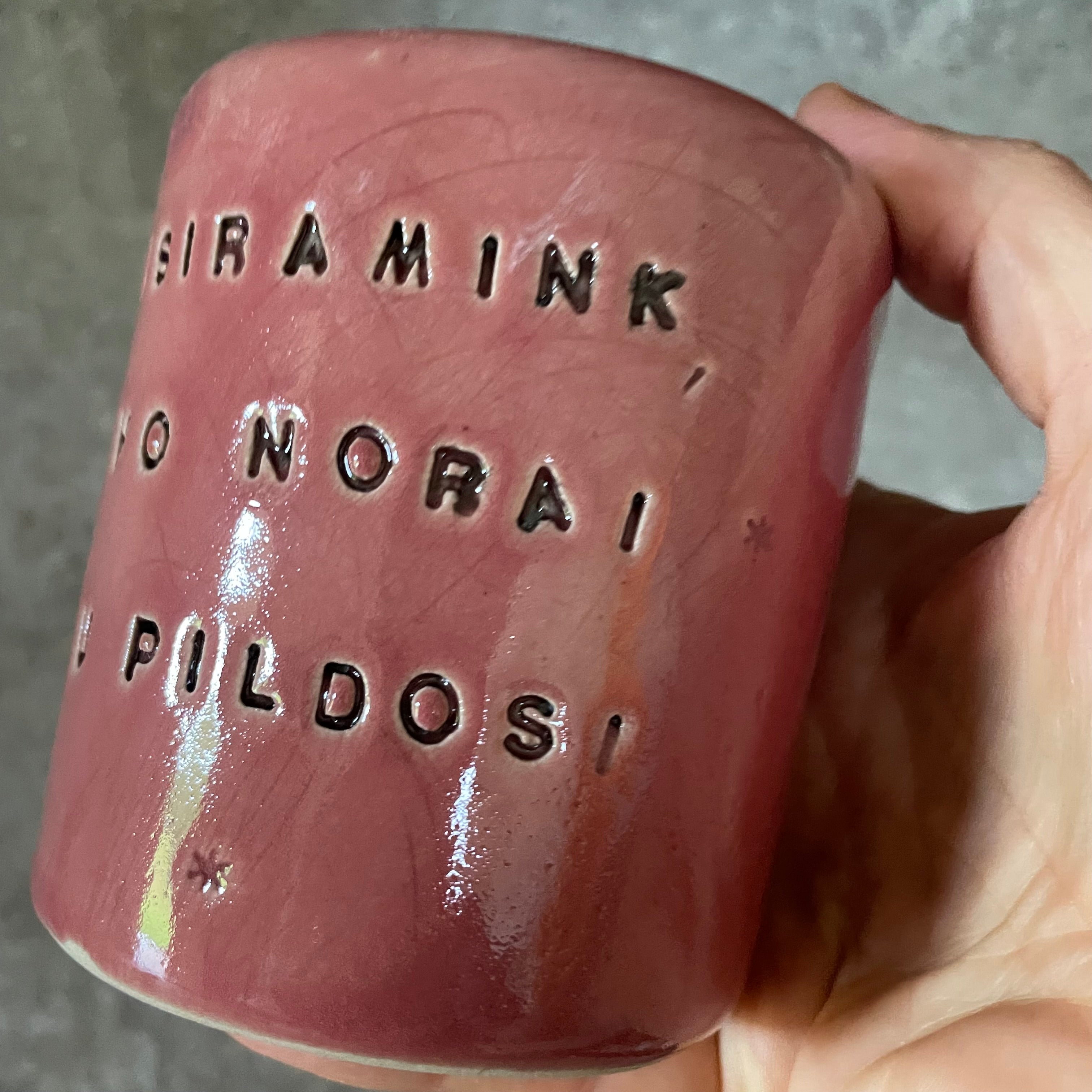 Pink mug with calming words without handle