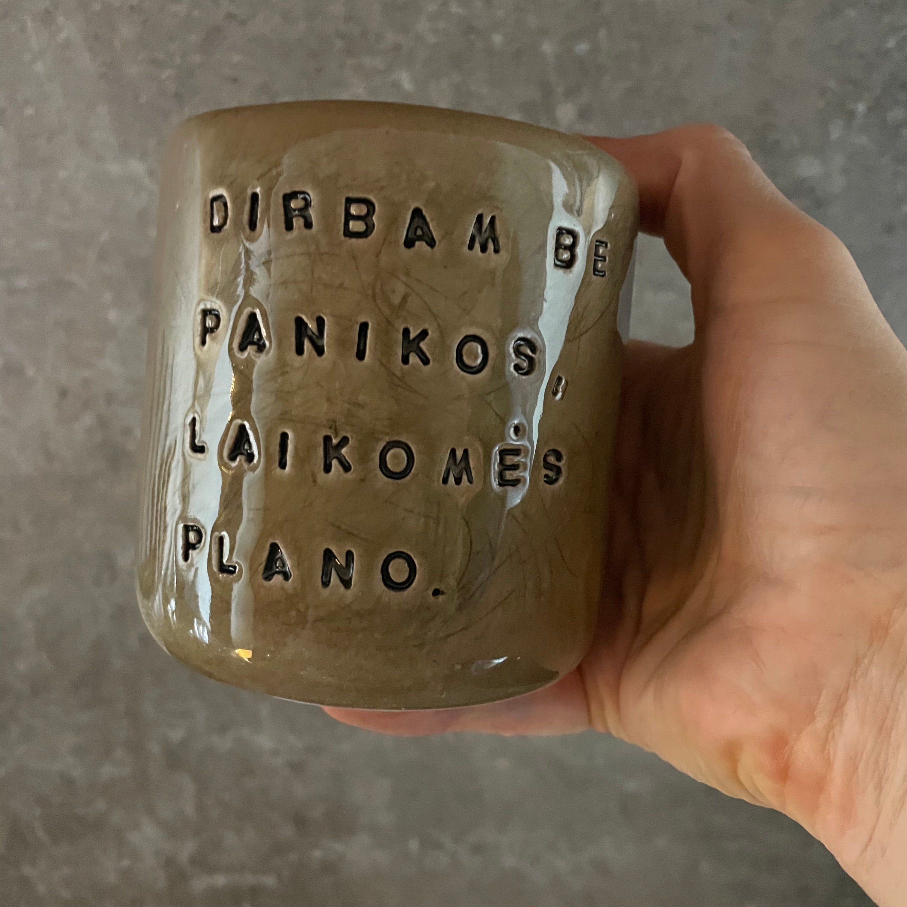 Dark brown tumbler mug with words about work
