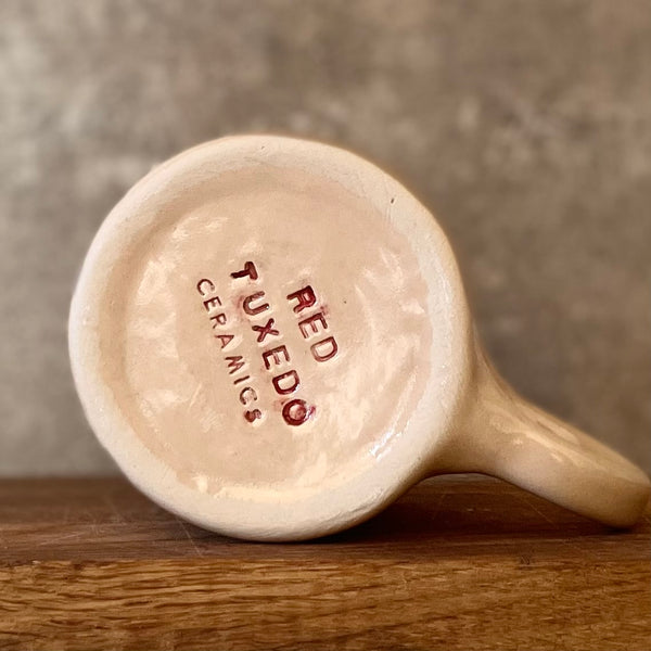Flat mug with prosecco saying