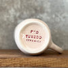 Pink mug with saying in Lithuanian