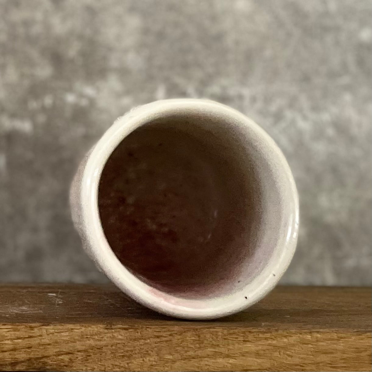 Pale pink mug with saying in Spanish