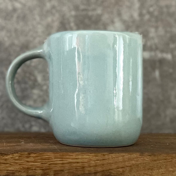 Blue mug with funny phrase in Lithuanian