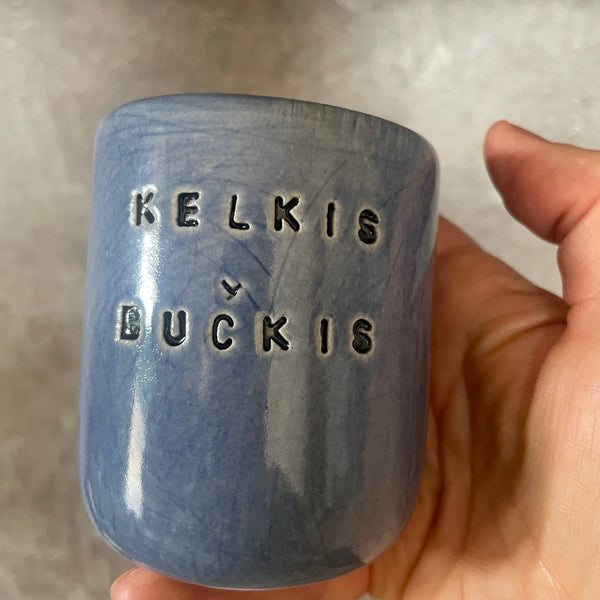 Mėlynas puodelis "Kelkis, bučkis" 150 ml