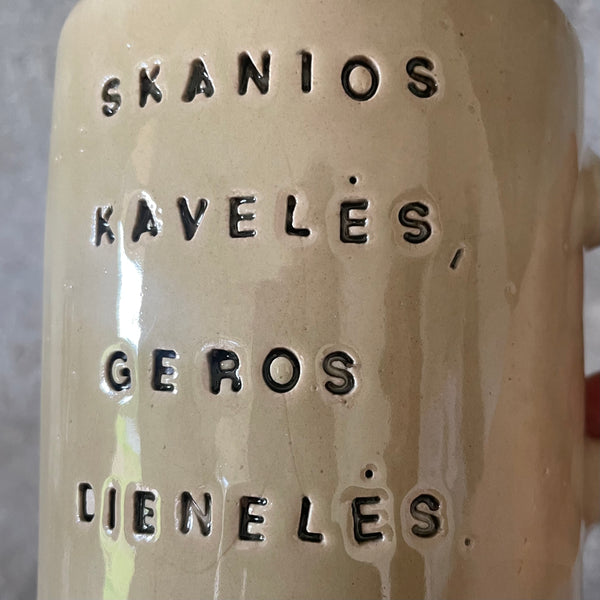Puodelis su gerais palinkėjimais