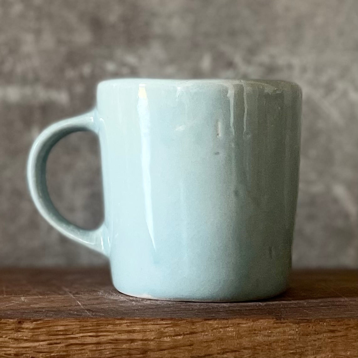 Blue mug with saying in Lithuanian