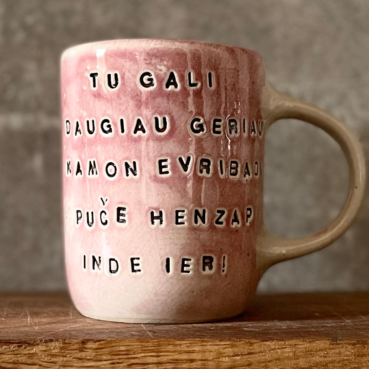 Pink mug with funny phrase in Lithuanian