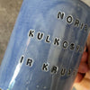 Blue mug with funny phrase in Lithuanian