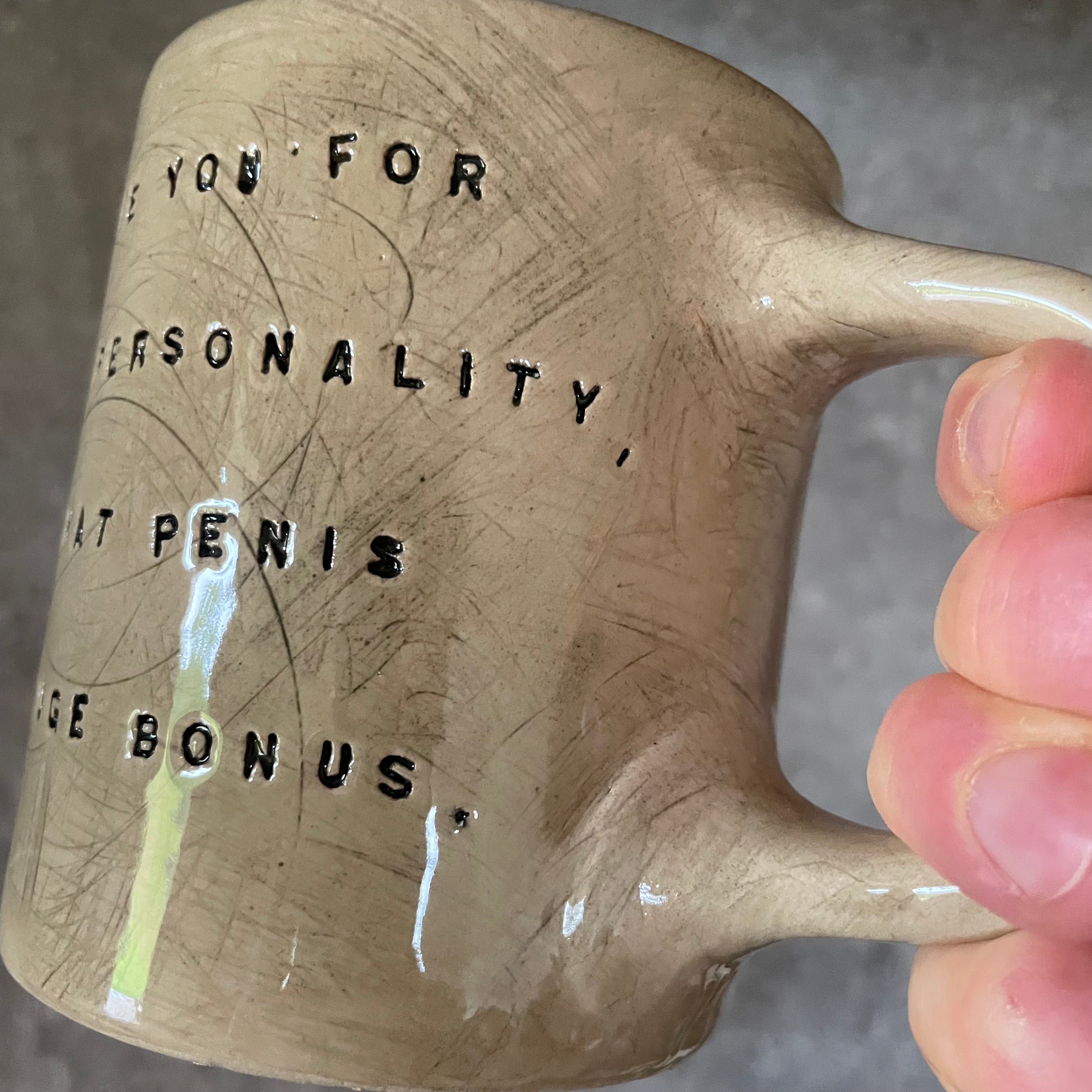 Brownish mug with funny saying
