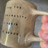 Brownish mug with funny saying