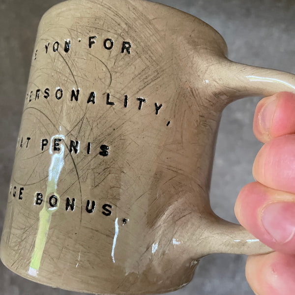 Brownish mug with funny saying