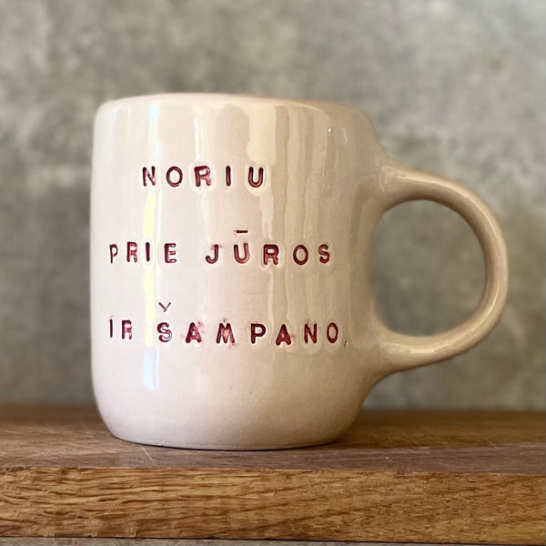 Rausvas puodelis ŠAMPANO