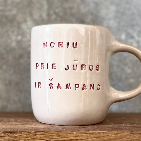 Rausvas puodelis ŠAMPANO