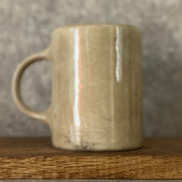 Beige mug with motivational saying