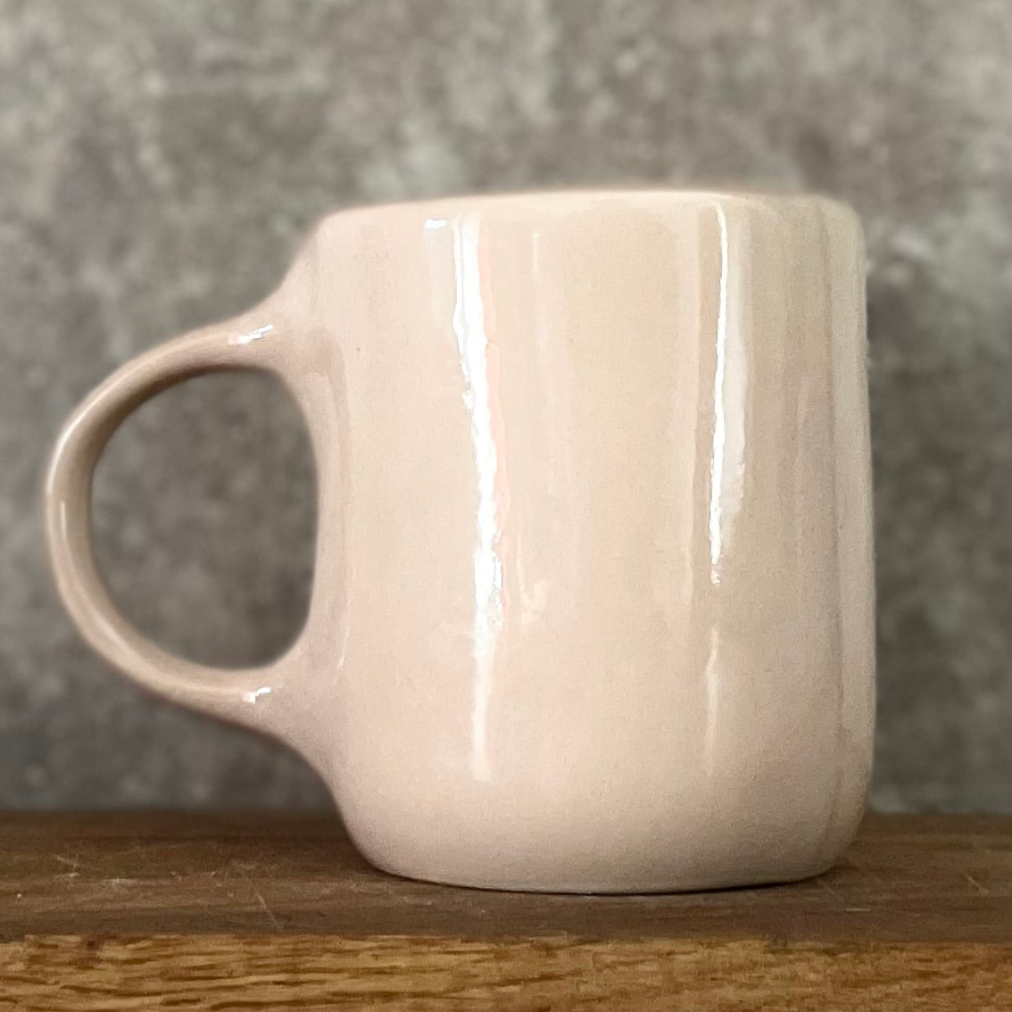 Pink big mug with saying in Lithuanian