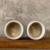 Set of two small mugs with words in Lithuanian - flat