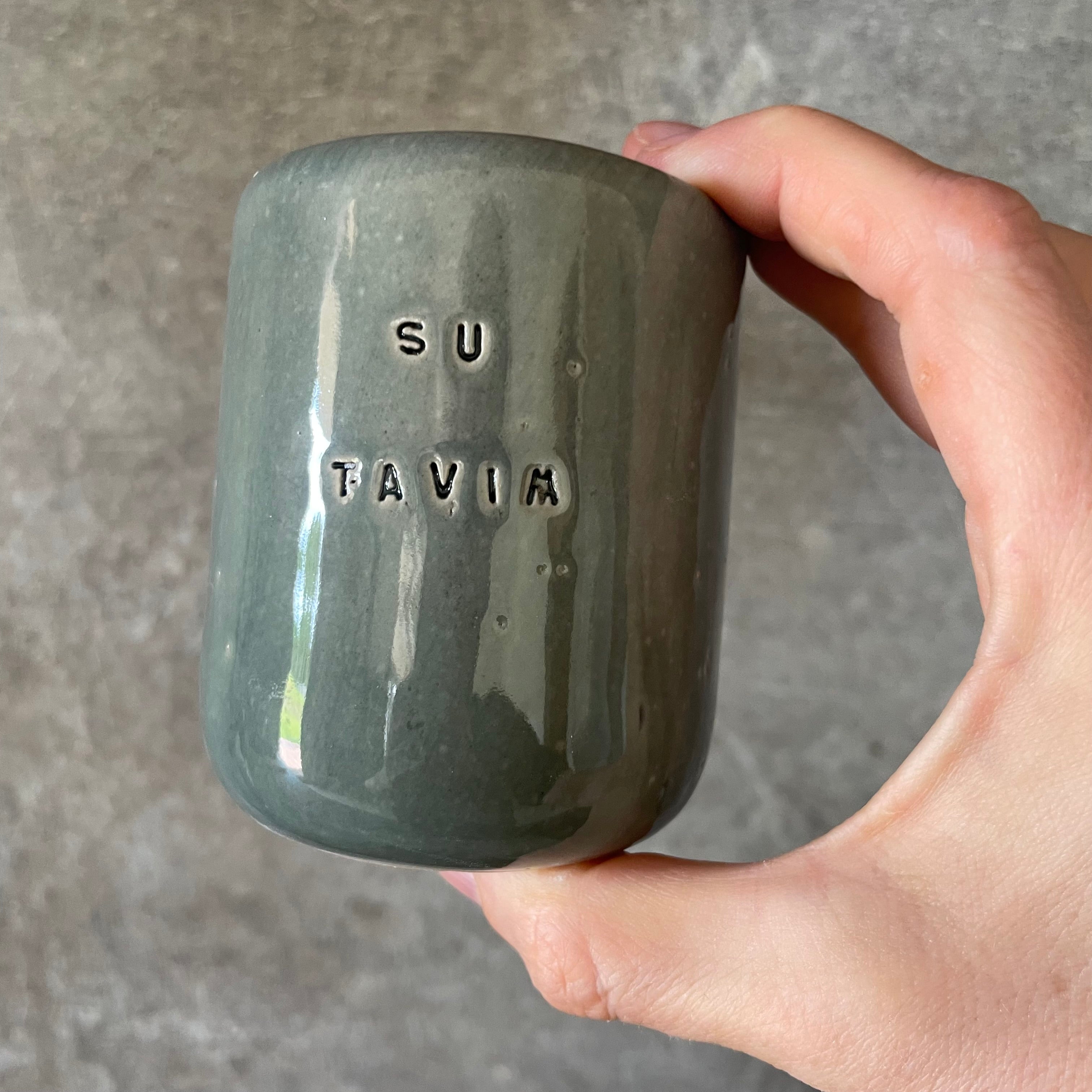 Set of small grayish mugs