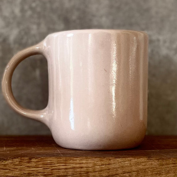 Pink big mug with saying in Lithuanian