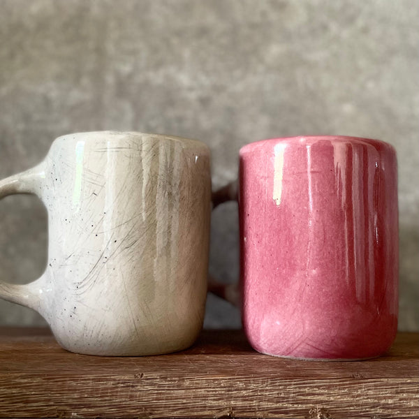A pair of big ceramic mugs for work and fun