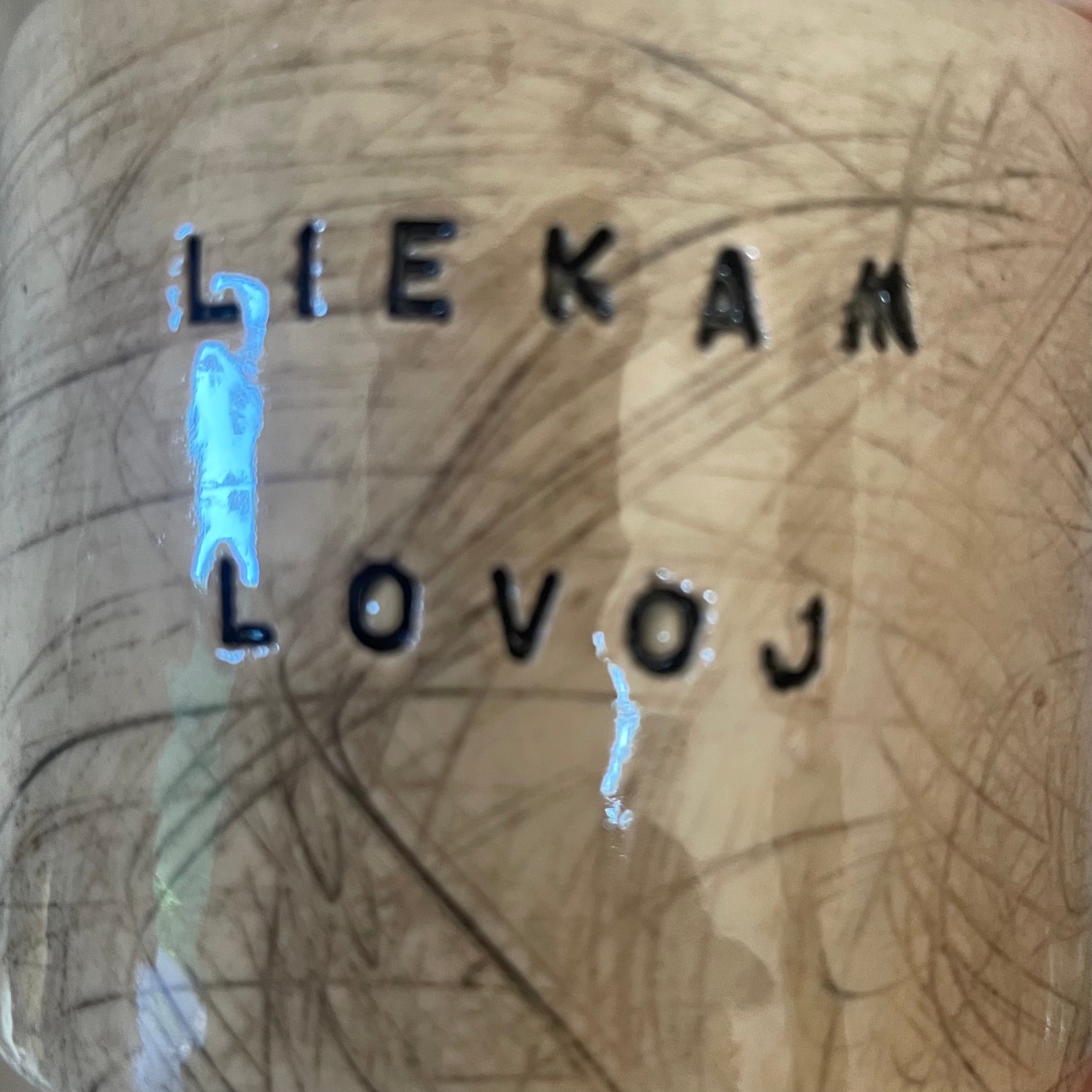 Set of two espresso mugs with words in Lithuanian