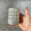 Puodelis su linksmu užrašu apie tekilą