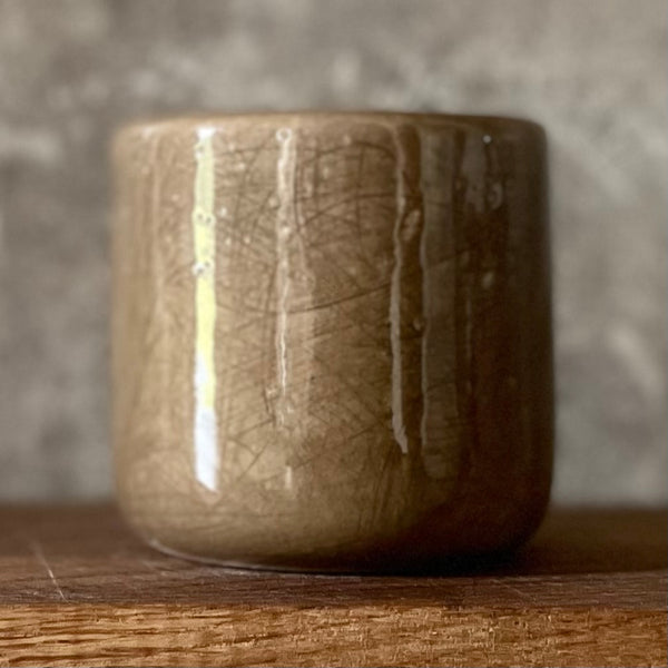Dark brown tumbler mug with words about work