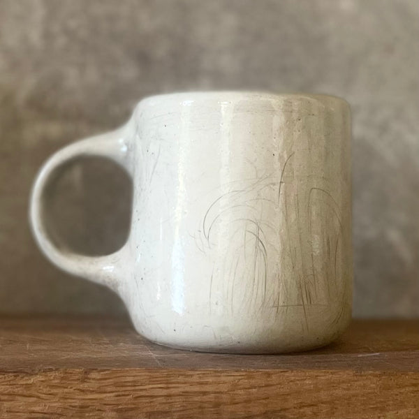 Speckled medium mug with words about work - one more