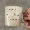 Pale pink mug with prosecco saying