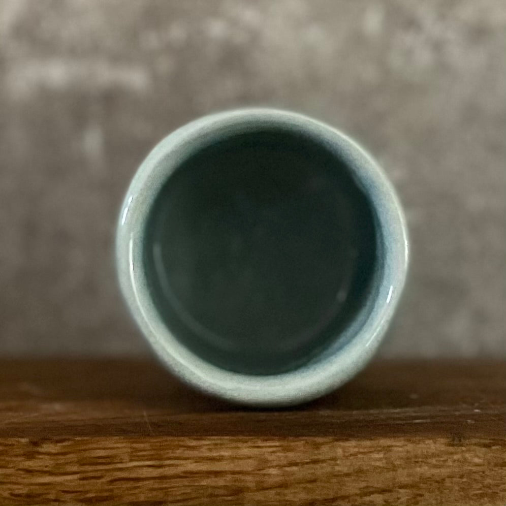 Mažas melsvas puodelis apie atostogas