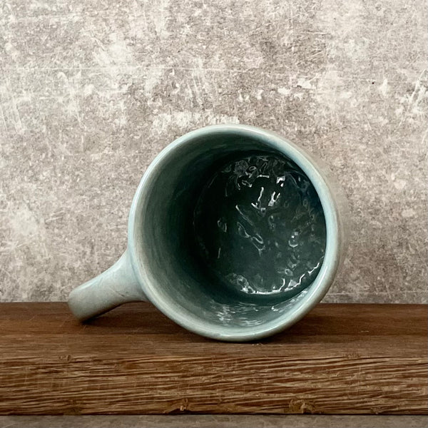 Light blue mug about spring