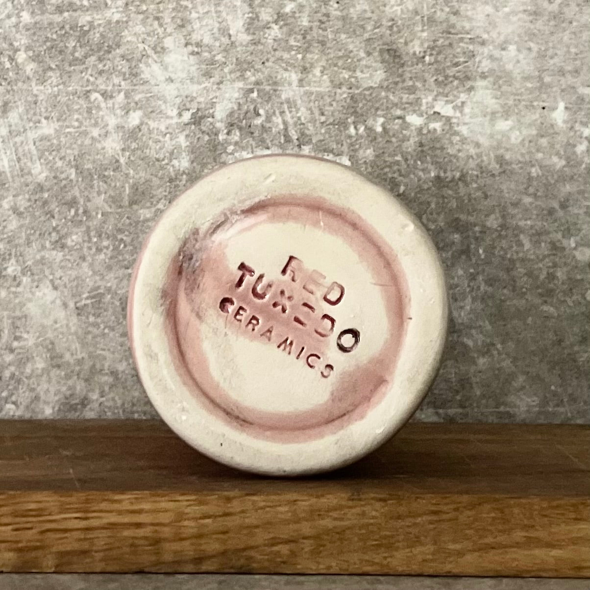 Pink mug with calming words without handle