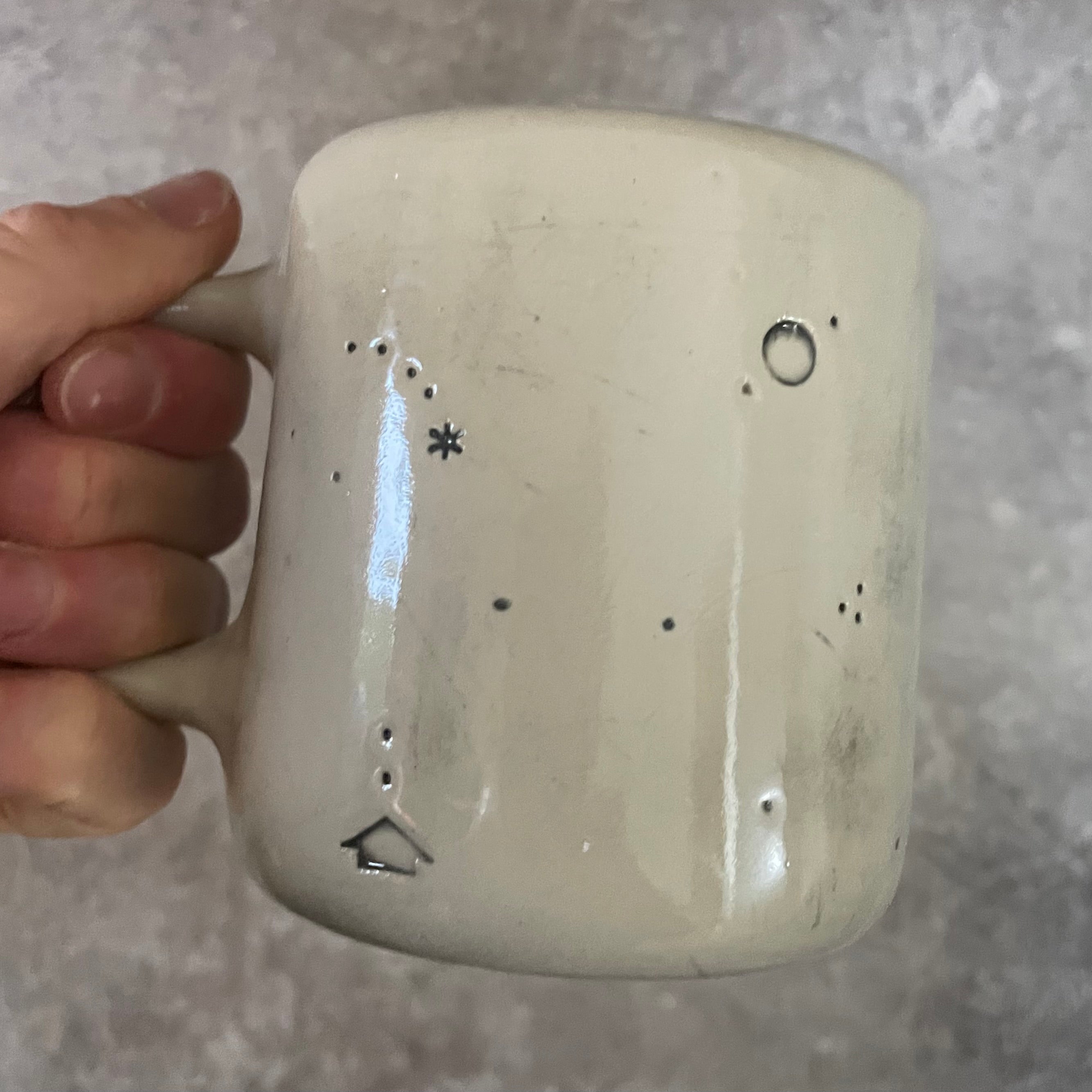 Ceramic mug with saying about magic