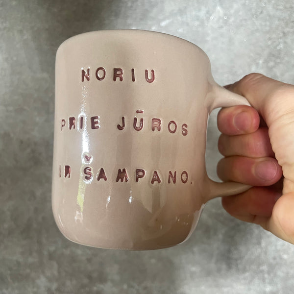 Rausvas puodelis ŠAMPANO